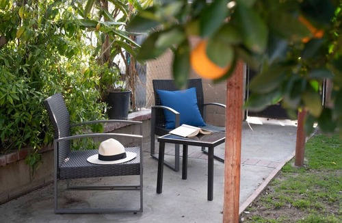 Azusa House | Green Oasis Retreat: 3 Bedrooms, Game Room with Air Hockey, Backyard Paradise with Cornhole, Gazebo, BBQ, and Eclectic Patio Delights
