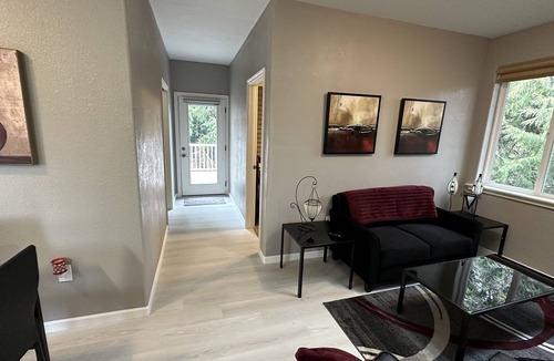 Meadow Glade Cottage | Guest House nestled in the trees with large deck, full kitchen, and laundry