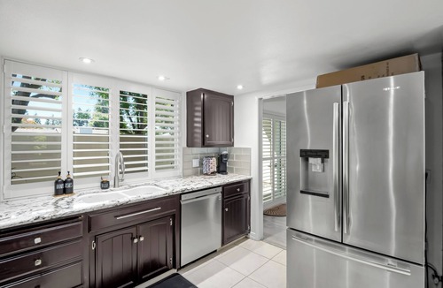 Fresno House | Hot Tub, Game Room - 3 Bed: 2 Bath near Fig Garden Loop!