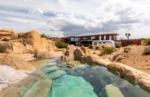Yucca Valley Villa | Iconic 7,000sf Glass Villa with 2 Pools on 350 Acres
