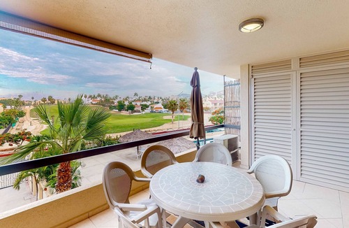 Zona Hotelera Apartment | Inviting apartment across from the beach with pool, grill, balcony & golf nearby