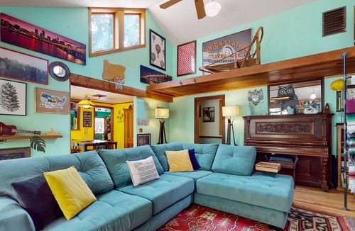 Tigard House | Inviting dog-friendly home with game room, fireplace, balcony, central AC, & W/D