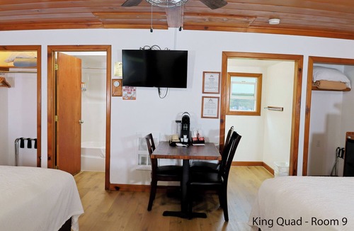 Florence Hotel | King Quad Rooms: Double King Beds & Rustic Woods Comfort for 5!