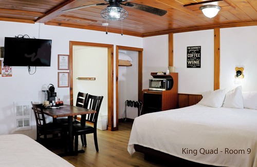 Florence Hotel | King Quad Rooms: Double King Beds & Rustic Woods Comfort for 5!