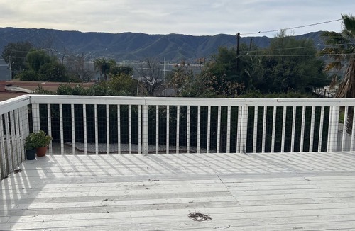 Lake Elsinore House | Lake view, pool, putting green
