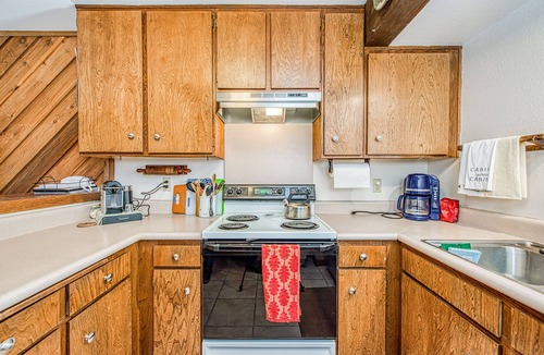 Lakeshore Condo | Lovely condo with free WiFi, pellet stove, large deck, & serene setting