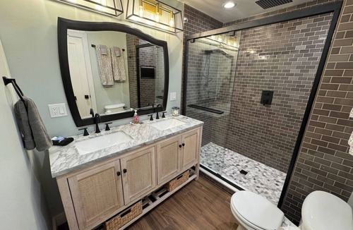 Humboldt Hill House | Master Bedroom & Bathroom Private Entrance and Patio Space