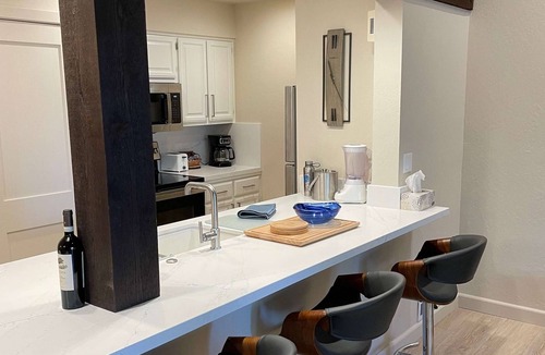 South Lake Tahoe Condo | Modern luxury awaits at this Lakeland Village condo with top-tier amenities