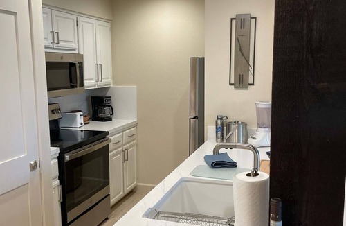 South Lake Tahoe Condo | Modern luxury awaits at this Lakeland Village condo with top-tier amenities