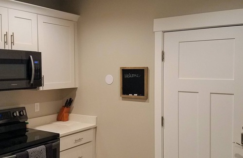 Riverton House | New, fresh and modern day light basement apartment with private entrance