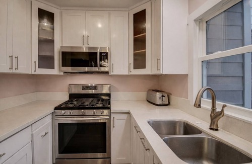 Westside Costa Mesa House | Newport Heaven: heated pool, jacuzzi, vineyard patio & fire table! Park zone.