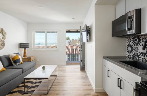 Townsite Condo | Oceanview Queen Suite Steps from the Sand (303)