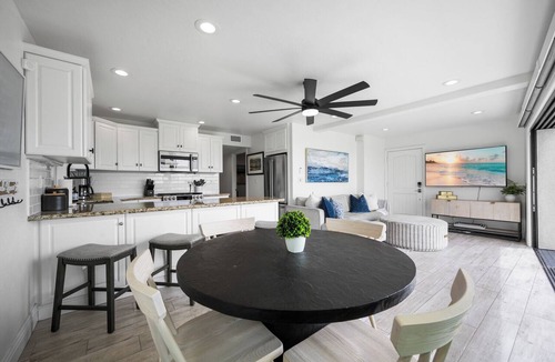 Balboa Peninsula Apartment | Patio on the Boardwalk steps to the Ocean