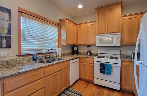 Historic Downtown District Apartment | Pioneer Mega 3 vacation homes offering 8 Bedrooms, 5 bathrooms, laundry, TV, and kitchens.