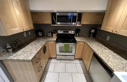 Olympus Cove House | Private Basement Apartment in Olympus Cove with EV Charger