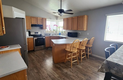 West Jordan House | Private bedroom with a shared bathroom in west jordan
