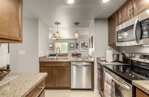 Paradise Valley Village Condo | RELAX IN PARADISE! Prime Scottsdale Location Adjacent to Golf Course!