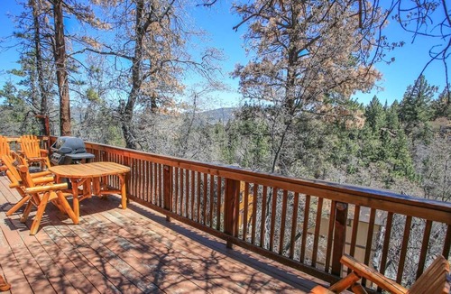 Upper Moonridge House | Rest N Relax Inn - Beautiful chalet-style cabin features dramatic forest and slope views!