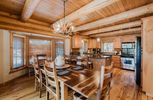 Three Rivers House | Riverfront log cabin style home with full kitchen deck washer & dryer and WIFI