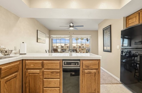 Bullhead City Condo | Riverfront Marina Retreat with Pool!