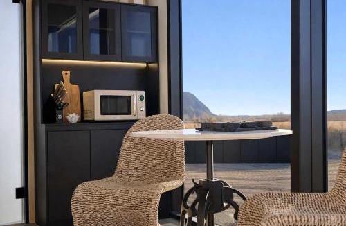 Torrey House | Scandinavian-Inspired Desert Retreat with Mirrored Views | Near Torrey, Utah