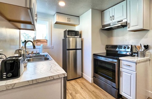 South Salt Lake House | SLC Mtn Escape: Hot Tub, King Bed, Gated Parking