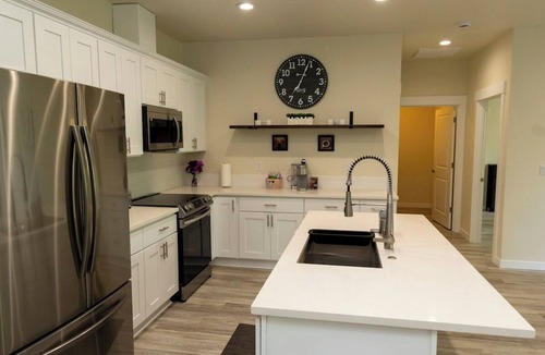 Longview House | Spacious home and lower level condo with outside entrance.