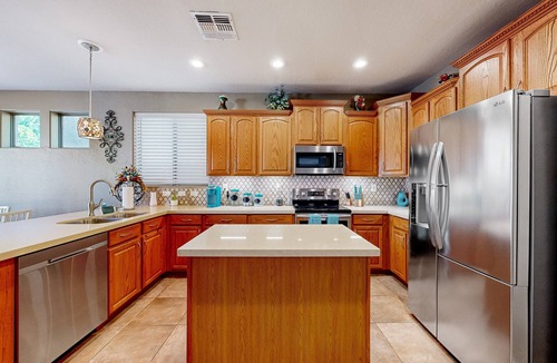 Litchfield Park House | Spacious home surrounded by palms with pool, grill, children's items, & W/D