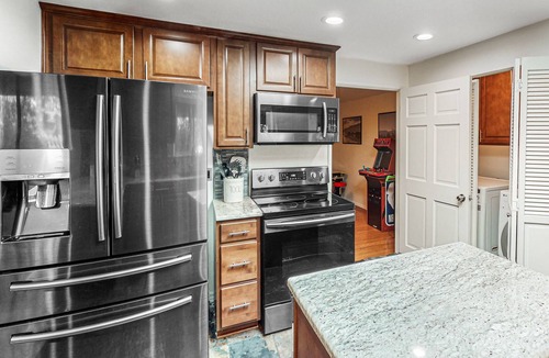 Southeast Bend House | Spacious retreat with private hot tub, dog-friendly, arcade