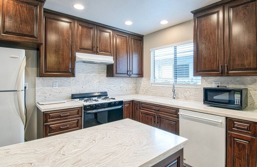 Balboa Peninsula Condo | Spacious upper rear unit in an oceanfront triplex just steps from the Balboa Pier fun!