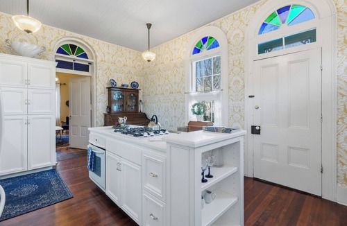 Jacksonville House | Stay in Jacksonville’s iconic 1861 B.F. Dowell House. Walk to Britt Festival, downtown, restaurants, and wine tasting while enjoying stained glass, marble fireplaces, private baths, gardens, and timeless historic charm.