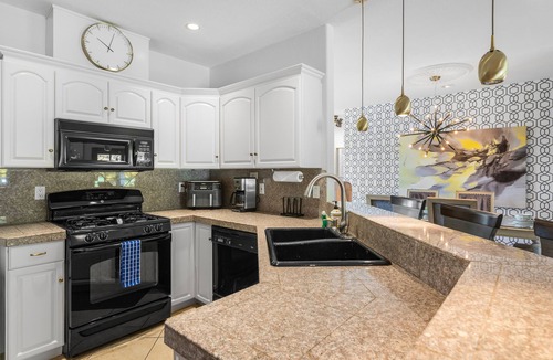 Racquet Club West House | Stylish, dog-friendly home with private pool, pool spa, enclosed yard & grill