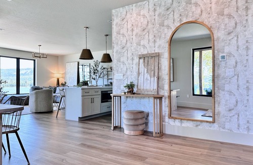 Sandpoint House | Stylish Waterfront Retreat, 100’ Private Yard and Beach + Panoramic Water Views