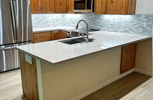 Carnelian Woods Condo | Tahoe condo with hot tub, central AC, fireplace, gas grill & balcony