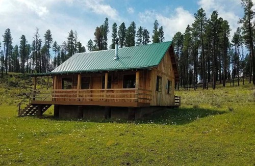 Blue House | The Beaver Creek Guest Ranch offers a peaceful setting for guests to relax.