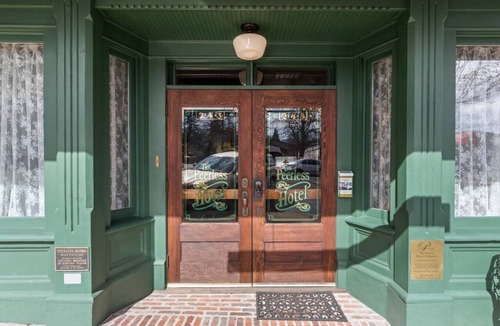 Historic Railroad District Apartment | The Peerless Hotel | Signature ADA Room #1 | Artist`s Abode | Historic District