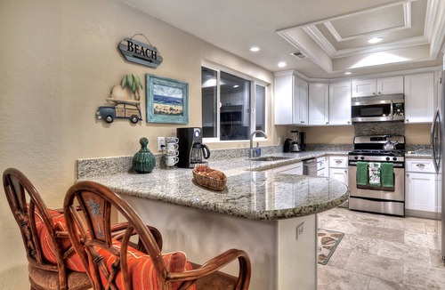 San Clemente Condo | Tropical home with loft, spacious deck, & outdoor dining - walk to the beach