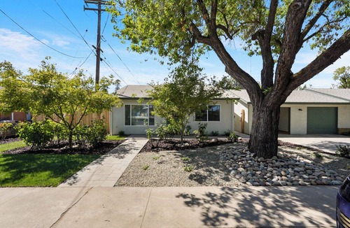 Modesto House | TVs in living and master, private yard and high-speed Wi-Fi.
