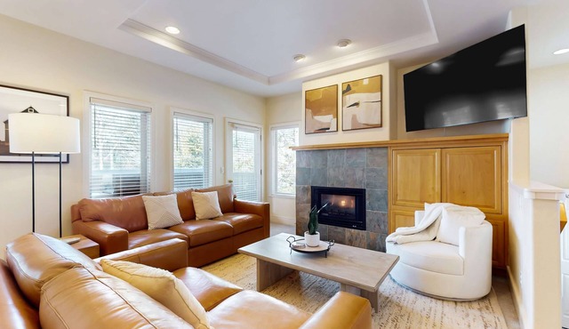 Conveniently located townhome with kitchen, kitchenette, balcony & fireplace