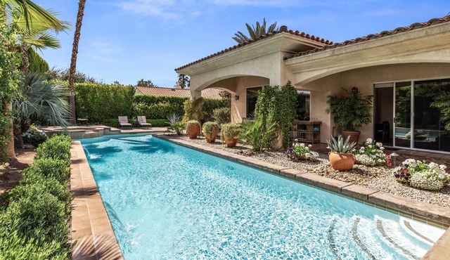 Exceptional Spanish-style home with private sparkling pool, spa & mountain view