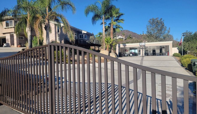 Gorgeous private gated estate in Rancho San Diego +4 car gym!