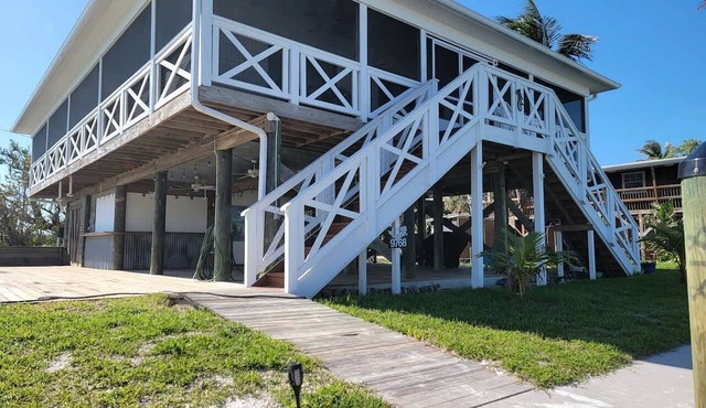 Gorgeous Waterfront Cottage with Private Dock and Incredible Bay Views for an Amazing Getaway in Placida, Florida in Placida