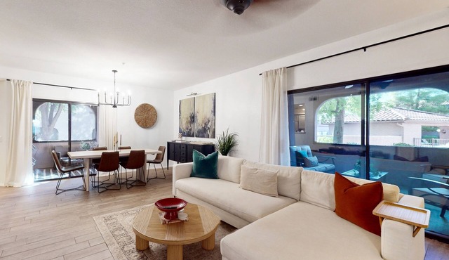 Modern ground-level townhome with two screened patios, grill, pool & hot tub