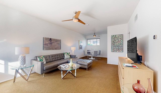Mountain-view condo with pool, hot tub, balcony, & central AC