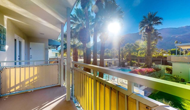 Mountain-view condo with pool, hot tub, balcony, & central AC