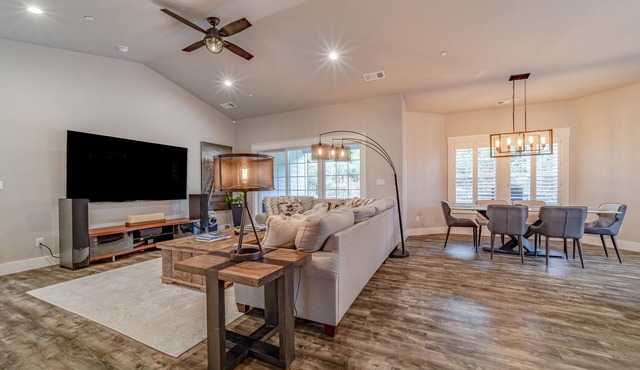 Newly built home with hot tub, fire table, game room & gym with Peloton bike