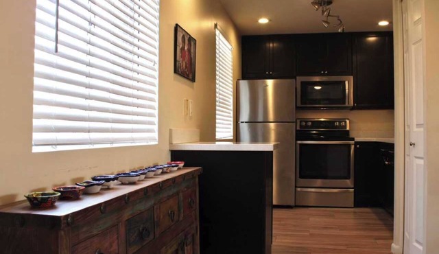 Old Town, Fashion Square, Camelback Mountain surround this Cozy Condo.