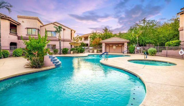 Prime Location, Upgraded Unit, 2 Private Patios, Heated Pool, Hot Tub, and More!