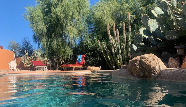 Private Desert Oasis with heated pool; spa; covered deck; spectacular views.