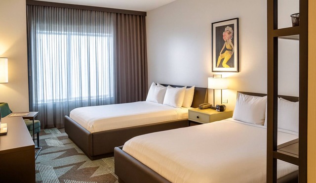 Proximity At its Best! Two Spacious 1BR Suites with Living Room and City View!